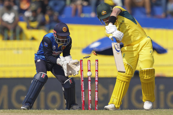 Australia’s Josh Inglis is bowled.