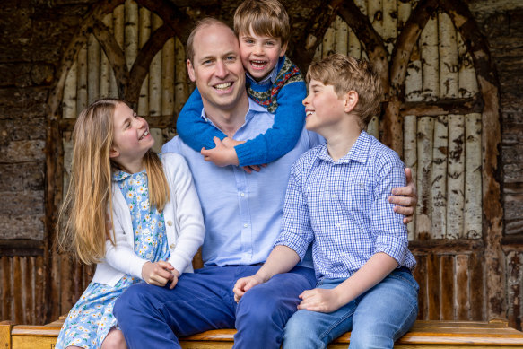 Prince William, Prince of Wales (centre) with his children Princess Charlotte, Prince Louis and Prince George (right) in Windsor, England.