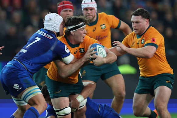 Tom Hooper of Australia looks for support from Matt Faessler.