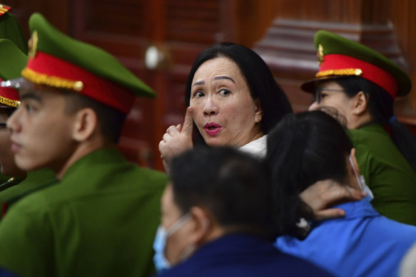 Truong My Lan, center, in court in Ho Chi Minh City.