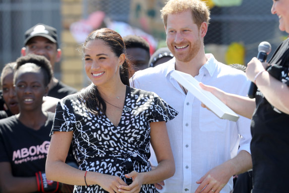Meghan, Duchess of Sussex, and Prince Harry, Duke of Sussex, visit a Justice Desk initiative in Nyanga township during their royal tour of South Africa.
