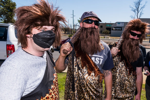 Men dressed as cavemen awaited Scott Morrison at a Bunnings in Perth.