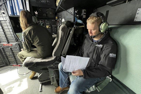 New Zealand Prime Minister Chris Hipkins is on a military plane heading to Auckland to assess Saturday's rain and flood damage.