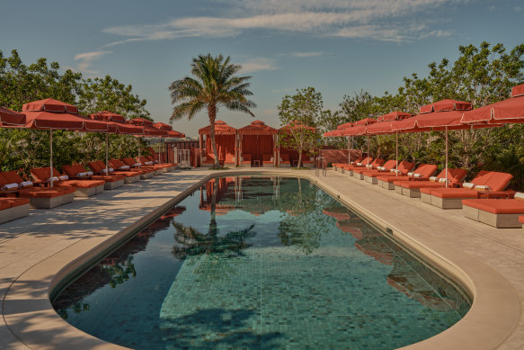 The 20-metre rooftop pool has a fun Beverly Hills vibe. 