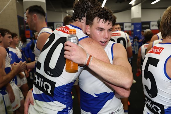 Nick Larkey and Finn O’Sullivan embrace after their win over the Bombers.