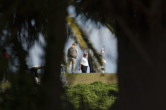 The President playing golf (again).