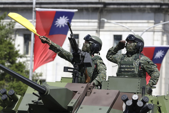 Taiwanese soldiers take part in National Day celebrations in Taipei.