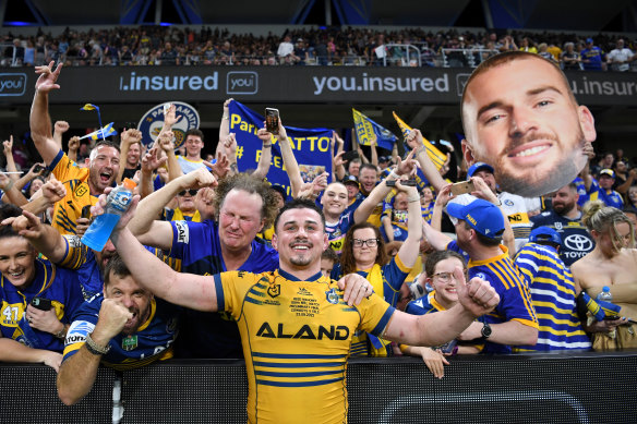 Reed Mahoney celebrates the preliminary final win on Friday next to Paul Galvin (left).