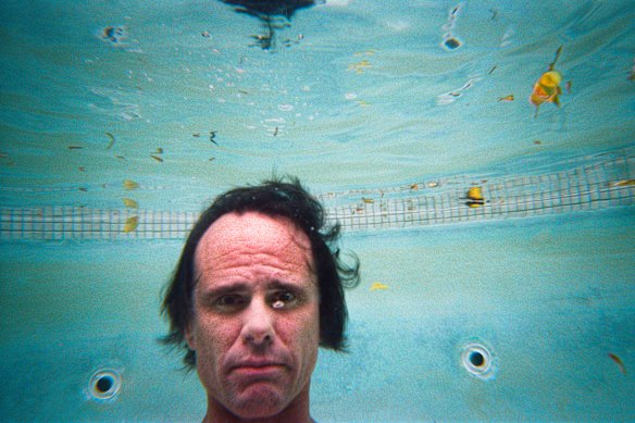 Walton Goggins swims at his temporary home in LA while he is filming Fallout.