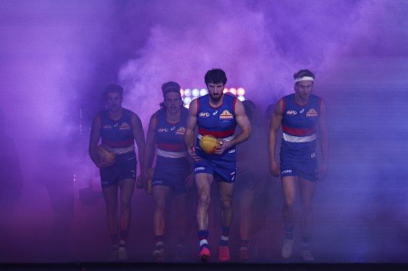 Marcus Bontempelli leads the Bulldogs out at the MCG.