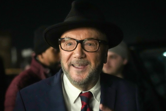 Workers Party of Britain candidate George Galloway celebrates with supporters at his campaign headquarters after being declared the winner in the Rochdale byelection.