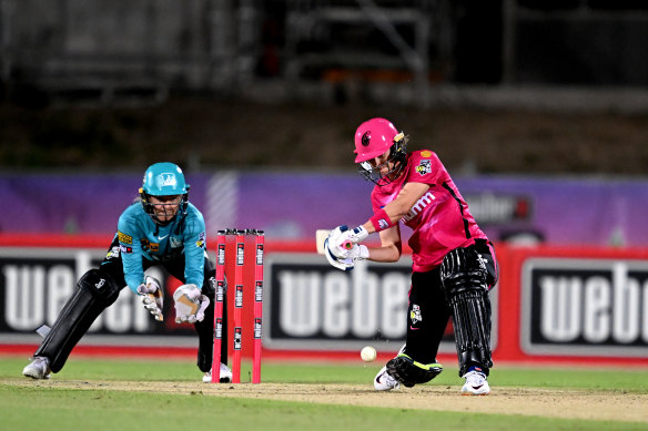 With two balls remaining, Maitlan Brown hits her first ball for six to claim victory for the Sixers against the Heat in the open WBBL match.