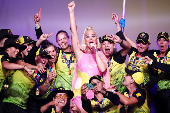 Katy Perry with the Australian team after the women's World T20 World Cup final at the MCG in March.