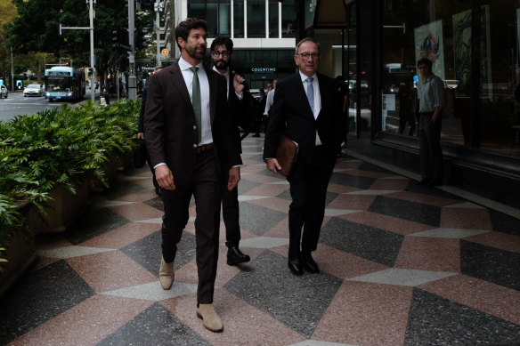 Heston Russell arrives at court on Wednesday with his lawyer Michael Bowe.