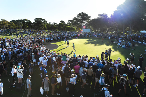 A huge crowd follows Cameron Smith at  the inaugural Australian LIV event in Adelaide.