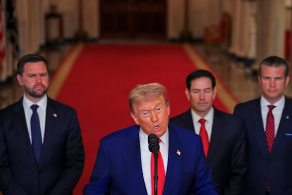 US President Donald Trump, with Vice President JD Vance, Secretary of State Marco Rubio and Defence Secretary Pete Hegseth, speaks from the White House in Washington on Sunday AEST.