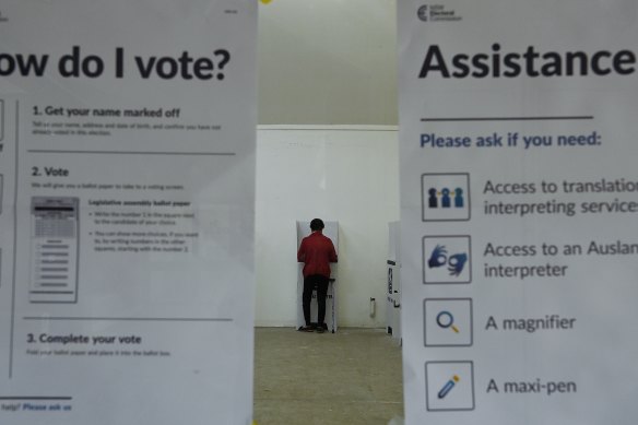 Getting in early: A woman votes at the pre-poll booth in Muswellbrook.