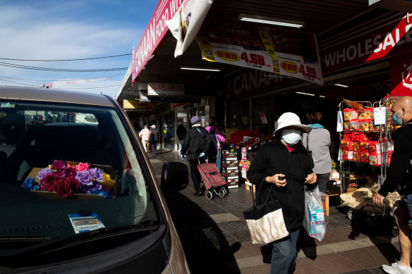 Shoppers on Campsie streets, within the Canterbury Bankstown area.