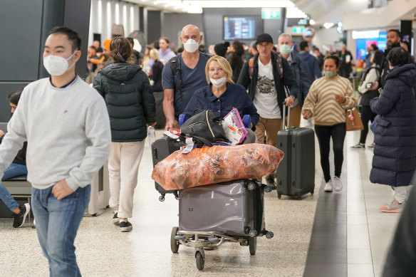 Travellers returning from Bali to Melbourne on Saturday morning. 