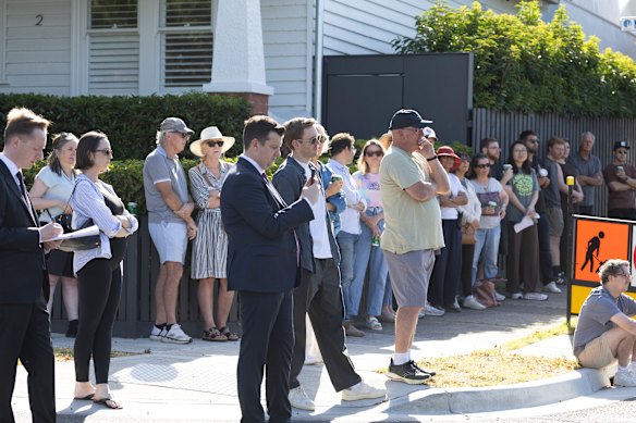 The crowd gets focused as bidding ramps up at 113 Whitby Street.
