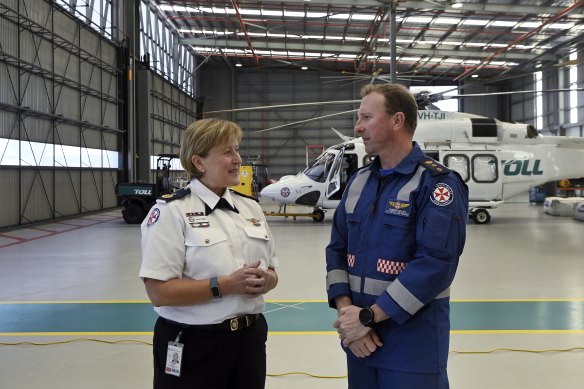 Executive director of aeromedical operations Dr Sarah Coombes and director of helicopter operations Cameron Edgar at the Bankstown base. 
