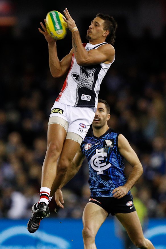 Rising star: Ben Long takes a grab for the Saints.
