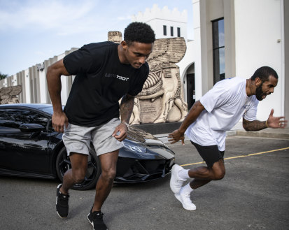 Jason Saab and fellow winger Josh Addo-Carr pose up for a mock sprint trial.