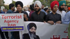 Members of the Sikh community in Lahore, Pakistan, hold a protest against the killing of Hardeep Singh Nijjar (seen on the banner).