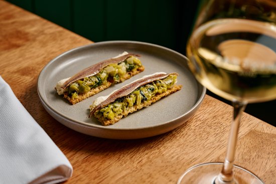 Wine and anchovy toast.