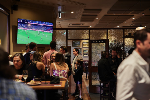 Watch the footy at the Orrong Hotel.