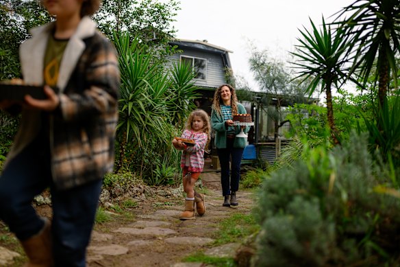 House of the Sun is a family affair. Alma Hanly helps mom Romina Gardella deliver their desserts to House of Suns. 