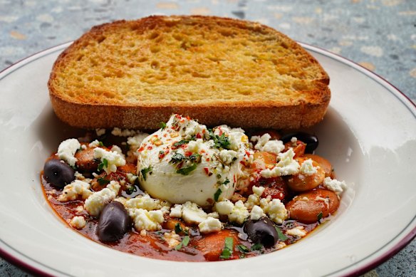 Claypot butter beans in a tomatoey gravy with black olives, a poached egg and a sprinkling of crumbly feta.