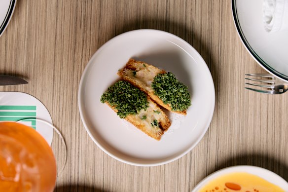 Prawn toastie with yuzu mayo and chives. 