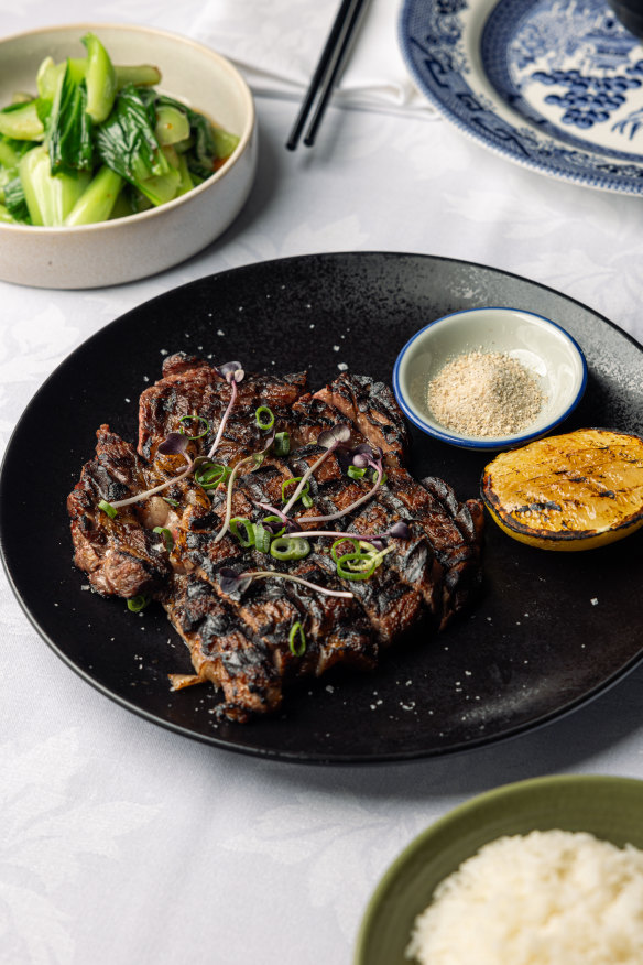 Grilled 300gm Angus scotch fillet with shiitake and lemon.