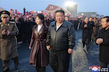 Kim Jong-un and his daughter inspect a farm in Pyongyang in 2024.