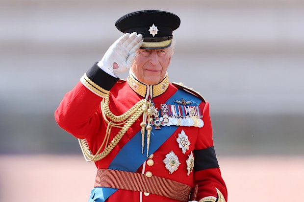 King Charles III salutes the troops during Trooping The Colour 2025 on June 14, 2025 in London, England.