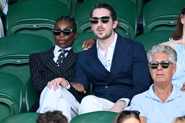 Michaela Coel and Spencer Hewett at the 2026 Wimbledon Championships at the All England Lawn Tennis and Croquet Club, London. Saturday July 4, 2026.