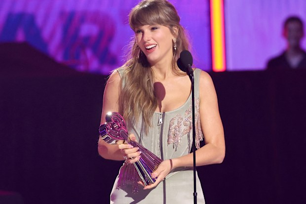 LOS ANGELES, CALIFORNIA - MARCH 26: (FOR EDITORIAL USE ONLY) Taylor Swift accepts the Pop Album of the Year award onstage at the 2026 iHeartRadio Music Awards at Dolby Theatre on March 26, 2026 in Los Angeles, California. (Photo by Kevin Winter/Getty Images for iHeartRadio)