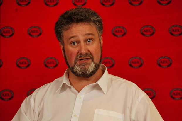 AEU Victorian Branch President Justin Mullaly provides an update on planned Term 2 industrial action at the union’s Abbotsford headquarters on Friday, 10 April 2026. Photo THE AGE/ LUIS ENRIQUE ASCUI