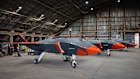Boeing Ghost Bat aircraft in their hangar.