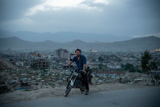 Afghanistan “became my identity”, says Andrew Quilty, pictured in front of Kabul’s Wazir Abad cemetery.