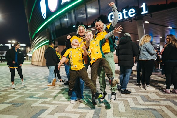 Matildas super fans Abby Coulls, and Ashley Coulls with kids Jackson, 6, and William, 9, outside Sydney Football Stadium live site, Moore Park.