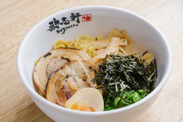 Chashu pork, nori and bamboo shoots top the original bowl.