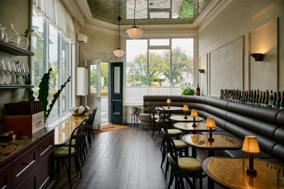 The fit-out has plenty of nods to Paris wine bars and a mirrored ceiling.