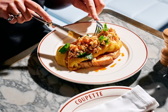 Breakfast dishes include a crab omelette with chilli and coriander.