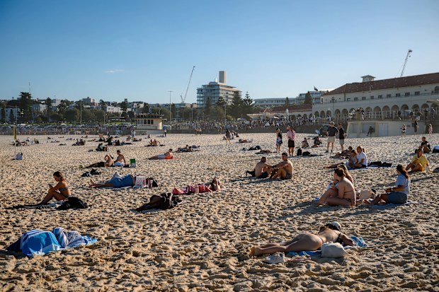 Beachgoers soak up the sun at Bondi Beach in June.