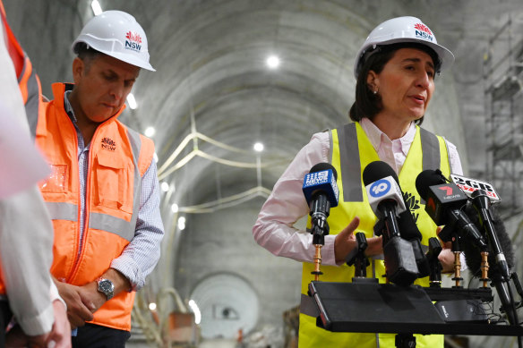 Business as usual: Gladys Berejiklian and Andrew Constance at the Martin Place Metro station on Thursday.