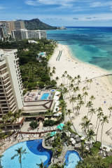 Aereal photo of Waikiki beach with view of Diamond Head mountain in the distance. iStock image for Traveller. Re-use permitted.