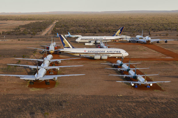 Airbus A380s, Boeing MAX 8s and other smaller aircraft grounded at a storage facility in Alice Springs in 2020 because of the coronavirus pandemic.