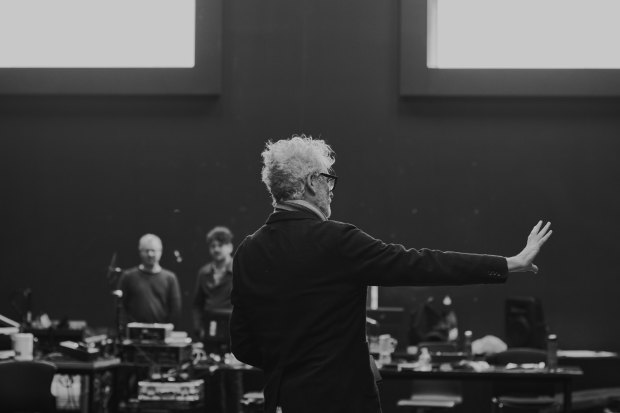 Brett Sheehy, Melbourne Theatre Company’s artistic director from 2012 to 2021, says, “Back to Back, to me, has been an eponymous company in everything but name – it’s been ‘Bruce Gladwin’s Back to Back’.”  Gladwin is pictured here directing the ensemble in rehearsal.